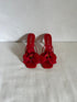 tacones rojos con flor